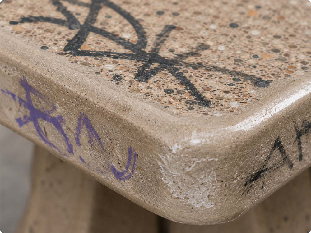 Graffiti removal example on concrete surface